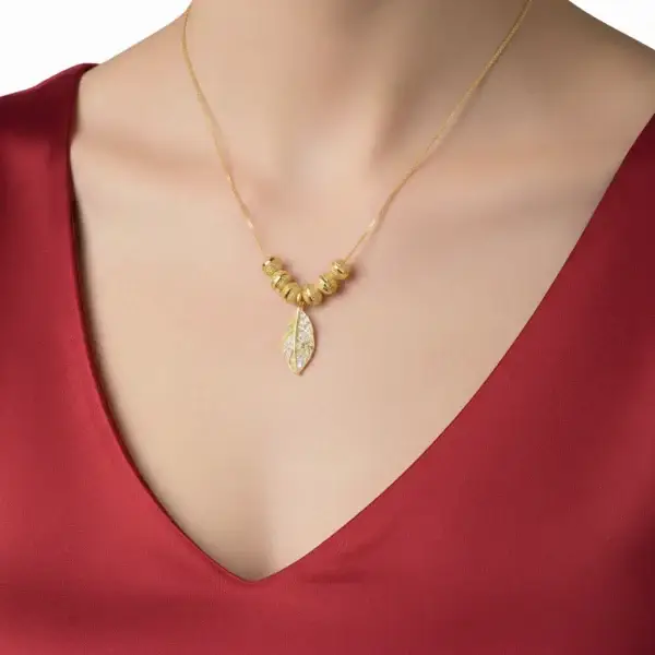 CHARUMART Royal Leaf Drop Gold Necklace for Women – Elegant Diamond Cut Pendant